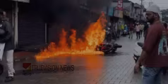 കോഴിക്കോട് പാളയത്ത് മഴയത്ത് തെന്നിവീണ ബൈക്കിന് തീ പിടിച്ചു; യാത്രികന് പരിക്ക് 