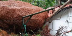 കെട്ടിടത്തിന് മുകളിലേക്ക് കൂറ്റന്‍ പാറക്കല്ല് അടര്‍ന്നു വീണു