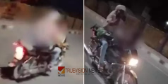 വല വിരിച്ച് പൊലീസ്; ഹൈവേയിൽ ​ഹെൽമറ്റില്ലാതെ ബൈക്കിൽ ദമ്പതികളുടെ അഭ്യാസ പ്രകടനം, ഞെട്ടിക്കുന്ന വിഡിയോ ദൃശ്യങ്ങൾ