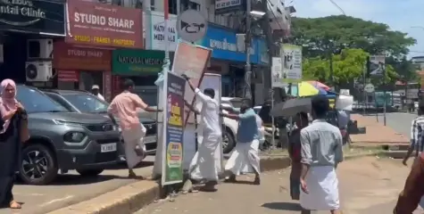 കണ്ണൂരിൽ എസ് എഫ് ഐ പ്രതിഷേധത്തിനിടെ അക്രമം ;കോൺഗ്രസ് കൊടിമരവും സുധാകരന് അനുകൂലമായ ഫ്ലക്സും തകർത്തു